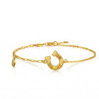 Gold-Plated Horseshoe and Charm Bracelet