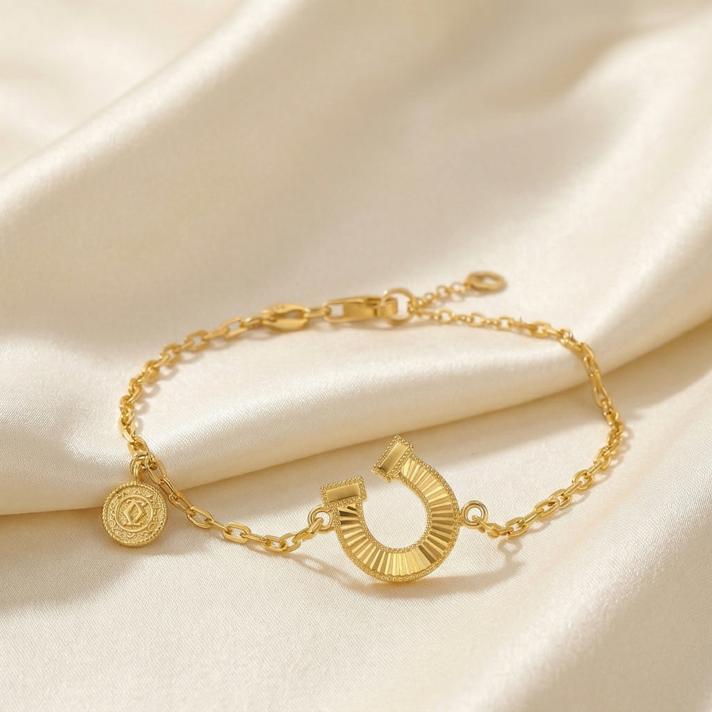 Gold-Plated Horseshoe and Charm Bracelet