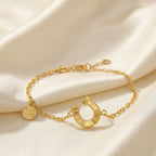 Gold-Plated Horseshoe and Charm Bracelet