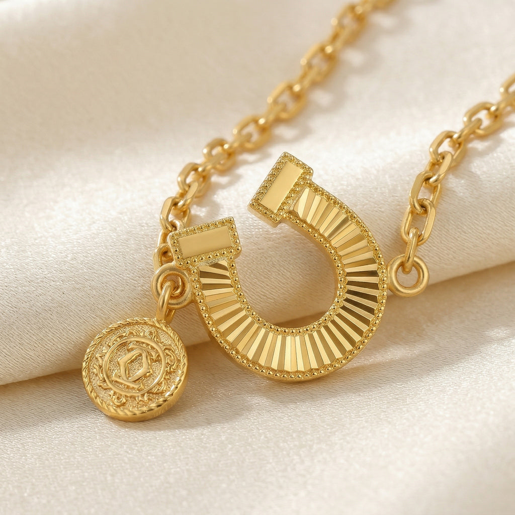 Gold-Plated Horseshoe and Charm Bracelet