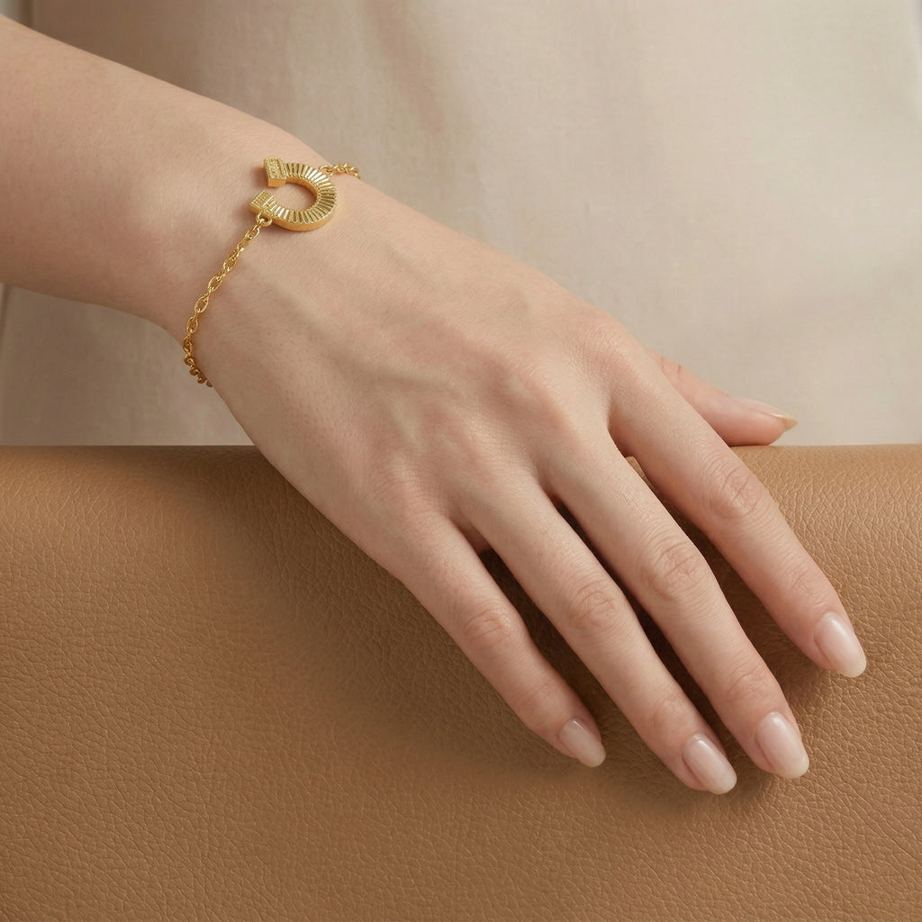 Gold-Plated Horseshoe and Charm Bracelet