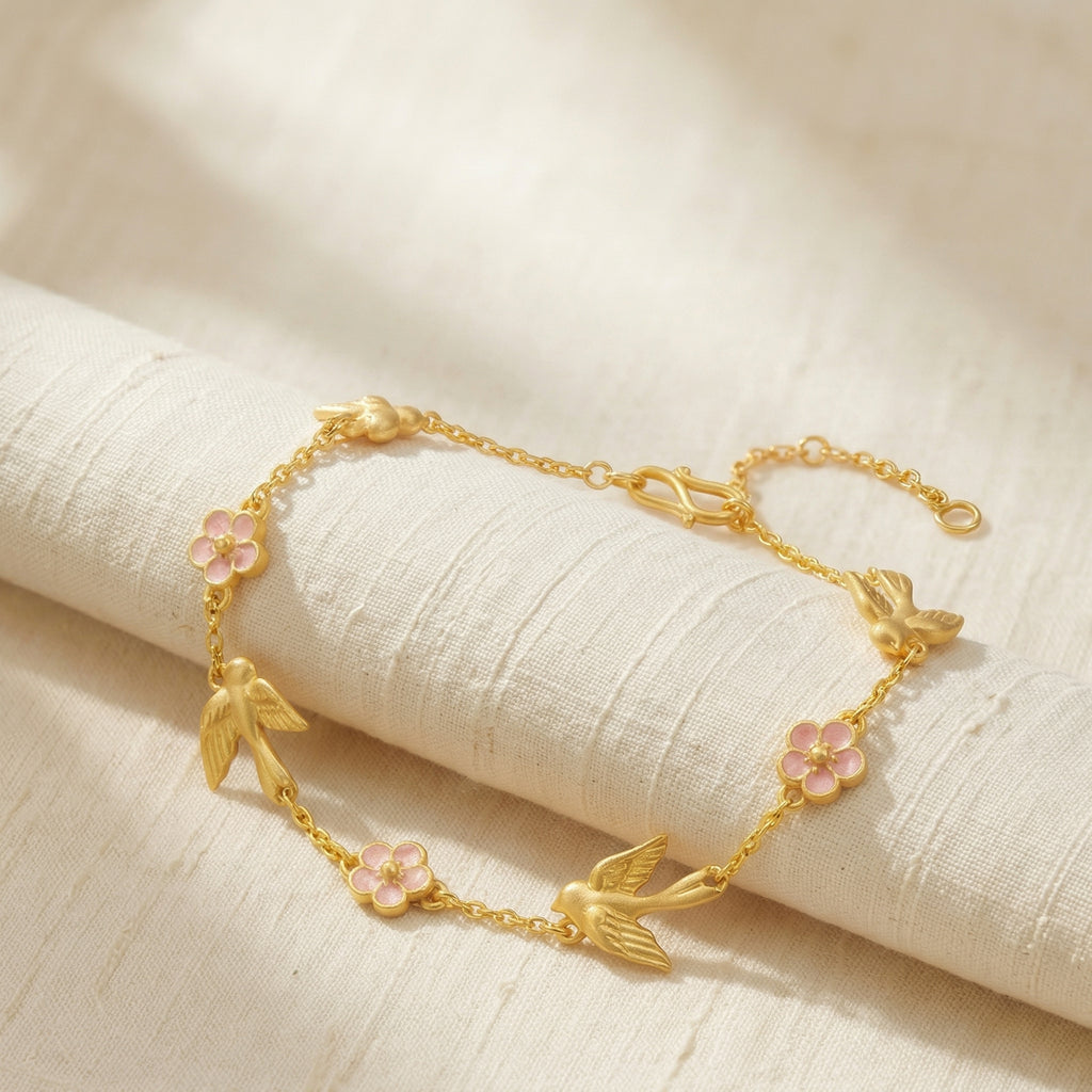 Gold-Plated Bird and Flower Charm Bracelet