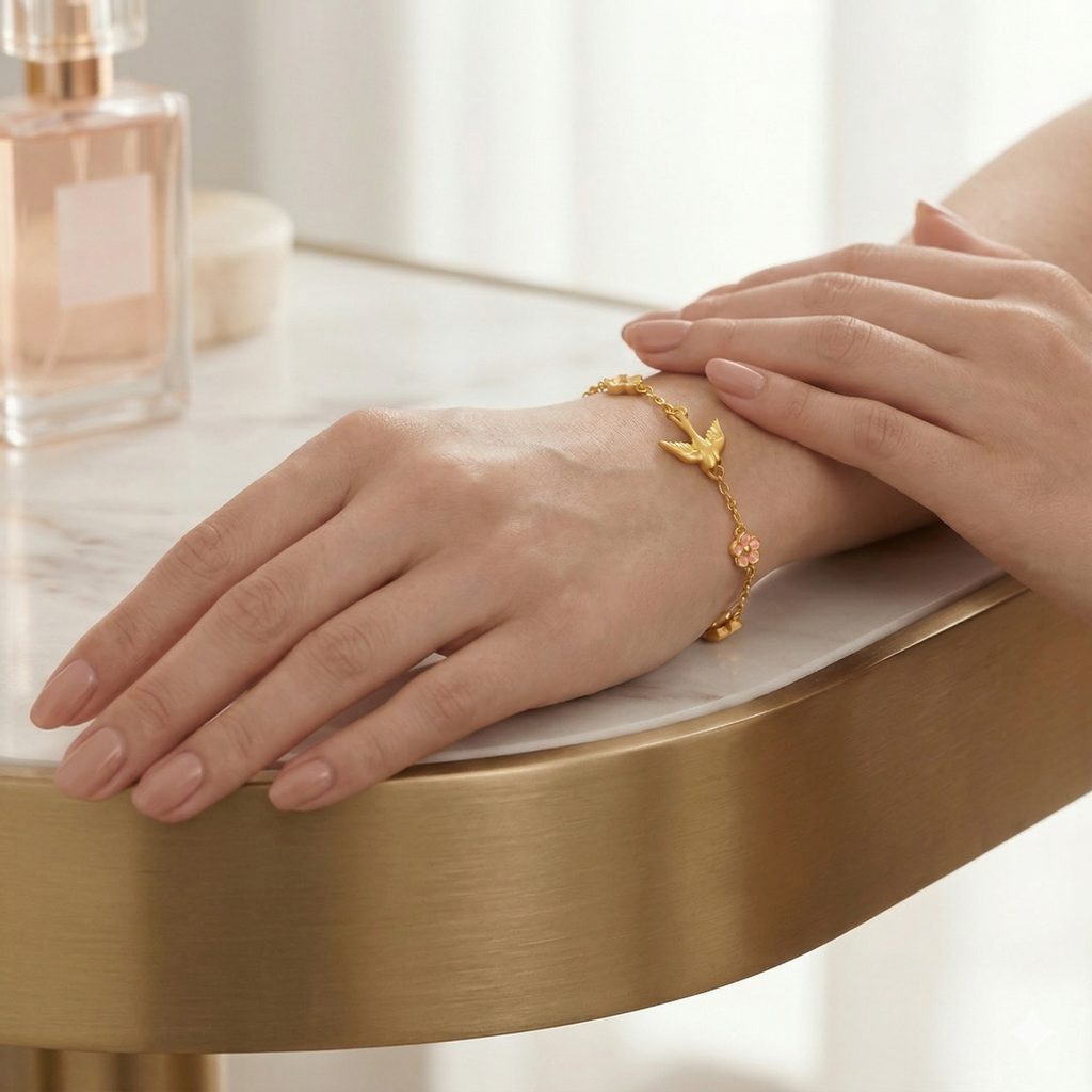 Gold-Plated Bird and Flower Charm Bracelet